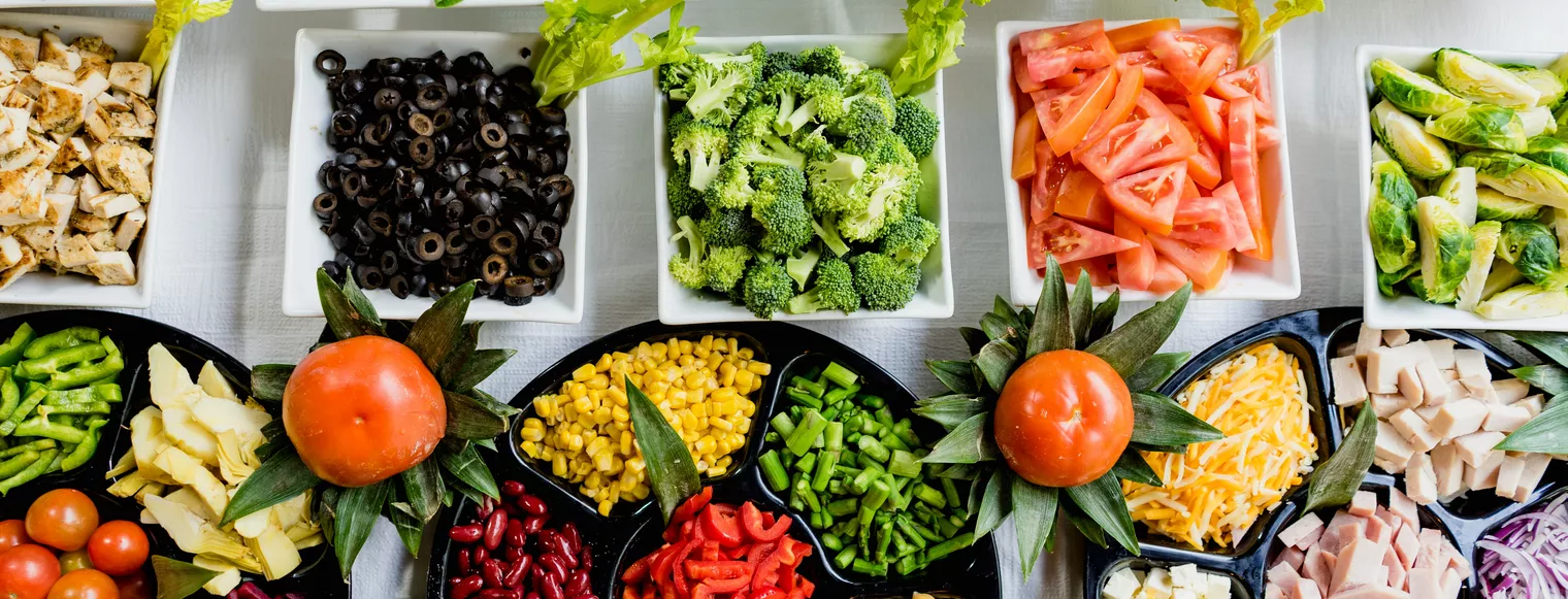 Photo of sorted vegetables for eating in serving dishes